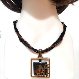 Chico's enamel Asian Geisha Girl multi-strand black gold beaded pendant necklace